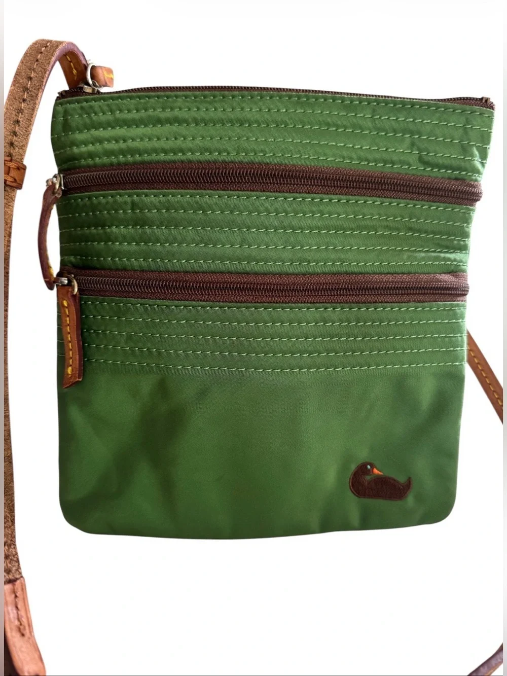 Dooney & Bourke Nylon North South Triple Zip Crossbody.Color: Kelly green nylon.
